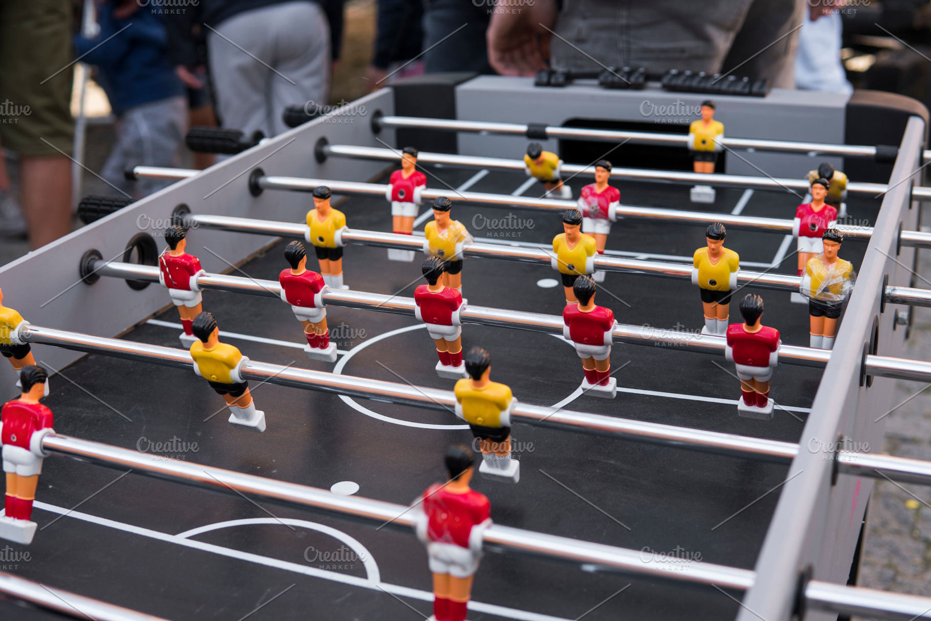Table football game soccer table featuring competition, team, and football, a Sports & Recreation Photo by volodymyrshtun13795