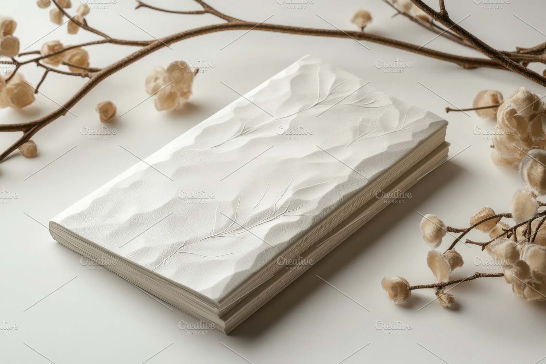 Elegant embossed book with floral ac, a Background Photo by Pixeness Studio