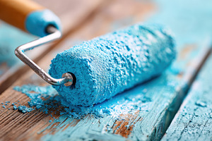 Blue paint roller on wooden surface, an Arts & Entertainment Photo by AlyaAnd