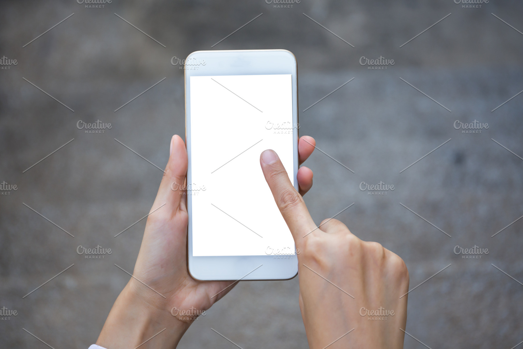 Mock up of woman hand holding mobile, a Technology Photo by Guitarfoto Studio