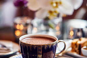 Hot chocolate service on a marble table with cookies in an elega, a Food & Drink Photo by Studio ANNA