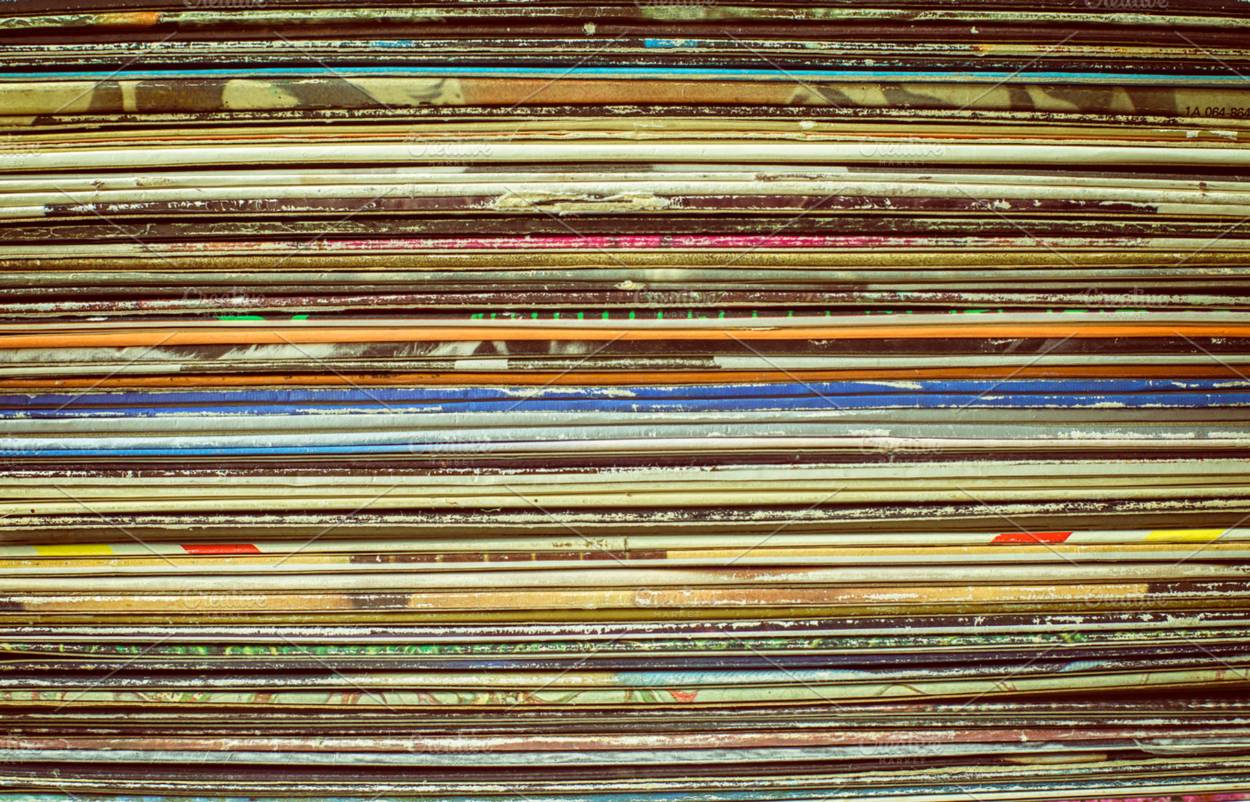 Stack of vintage album covers featuring classic, vinyl, and collection