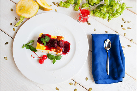 Plate with dessert and spoon on, a Food & Drink Photo by Photo Drive Studio