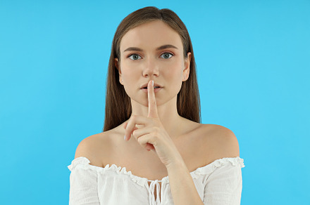 Concept of people, young woman on blue background, a Person Photo by AtlasStudio