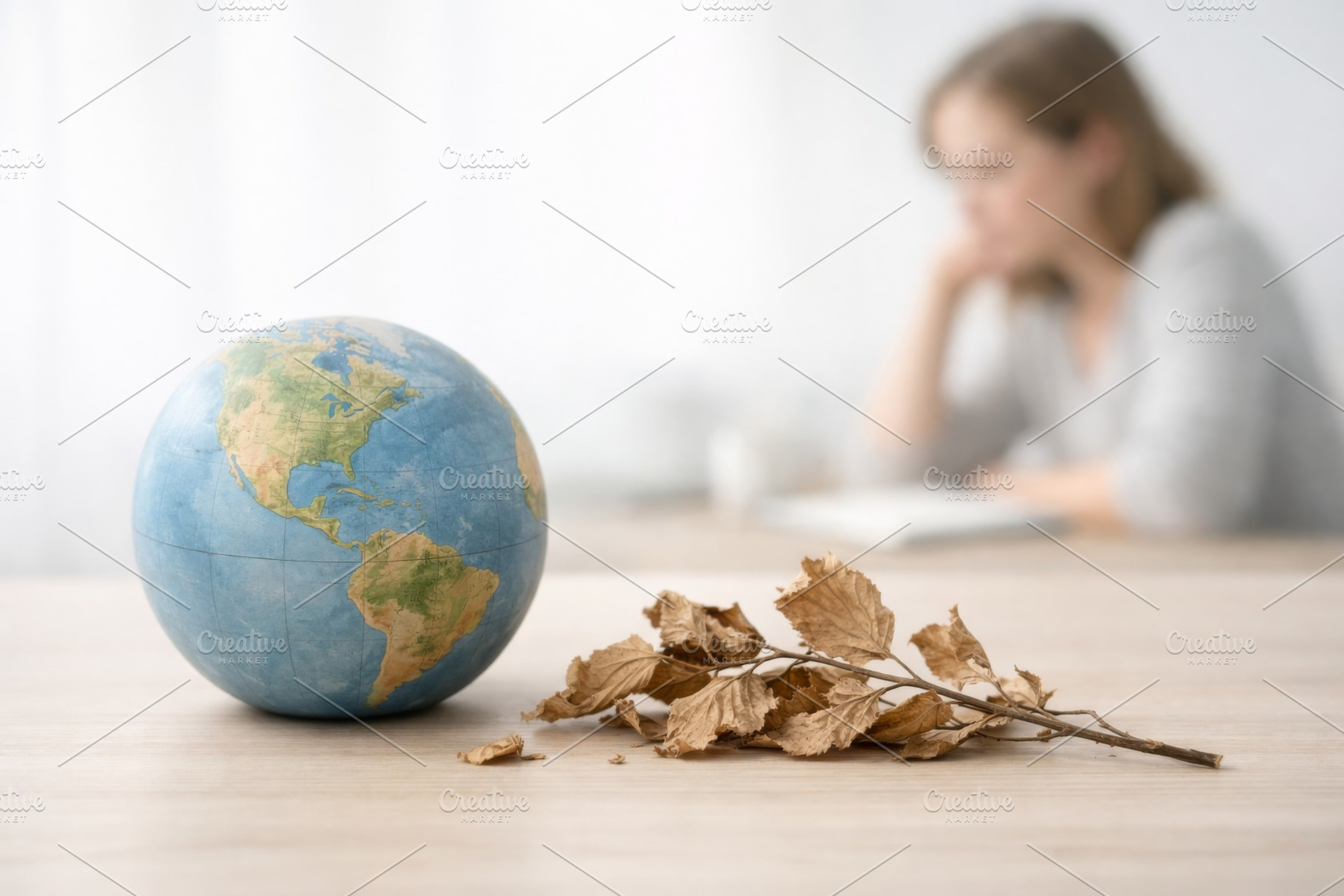 Globe and dried leaves symbolize anx, a Photo by Dvoevnore photos