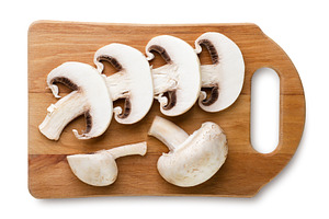 Sliced champignon mushrooms on a, a Food & Drink Photo by innakreativ