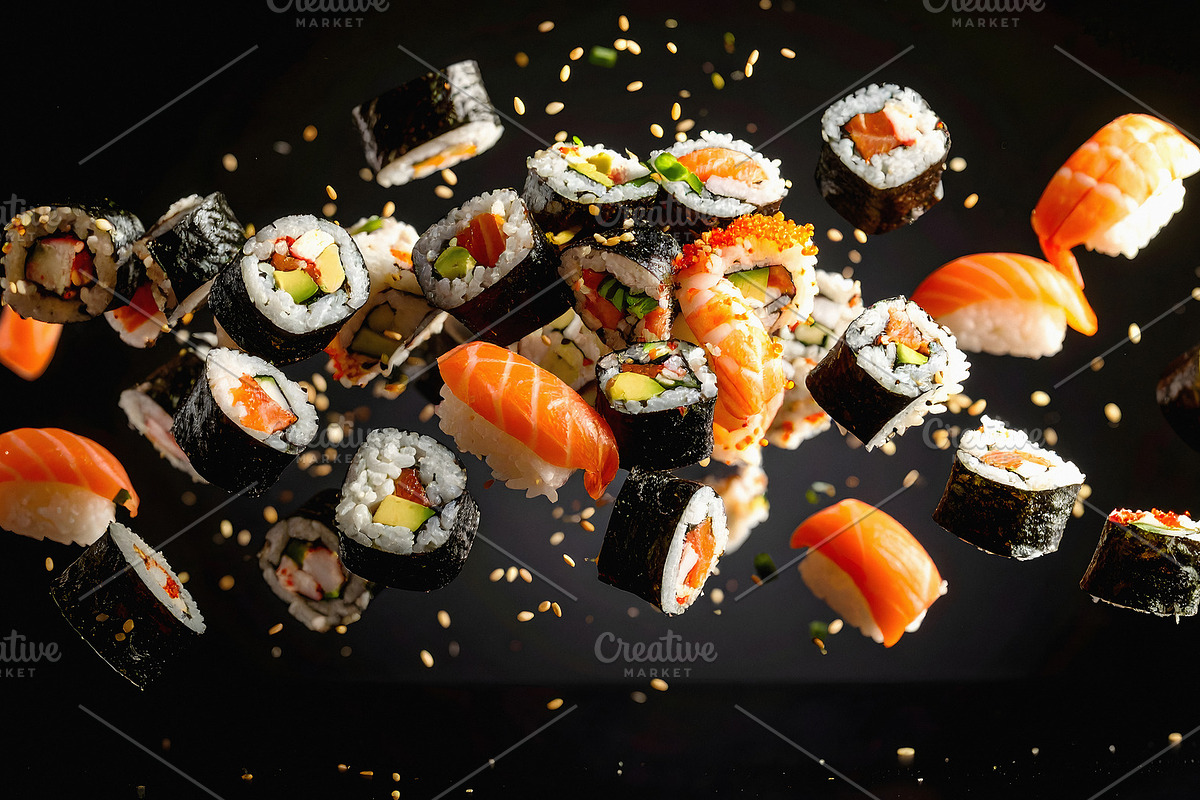 Assorted sushi rolls and nigiri pieces flying in midair, a Food & Drink Photo by GoodGoods (Photo 1 of 2)