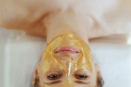 relaxed female in massage cabinet laying on massage table, a Health & Medical Photo by Alliance Images