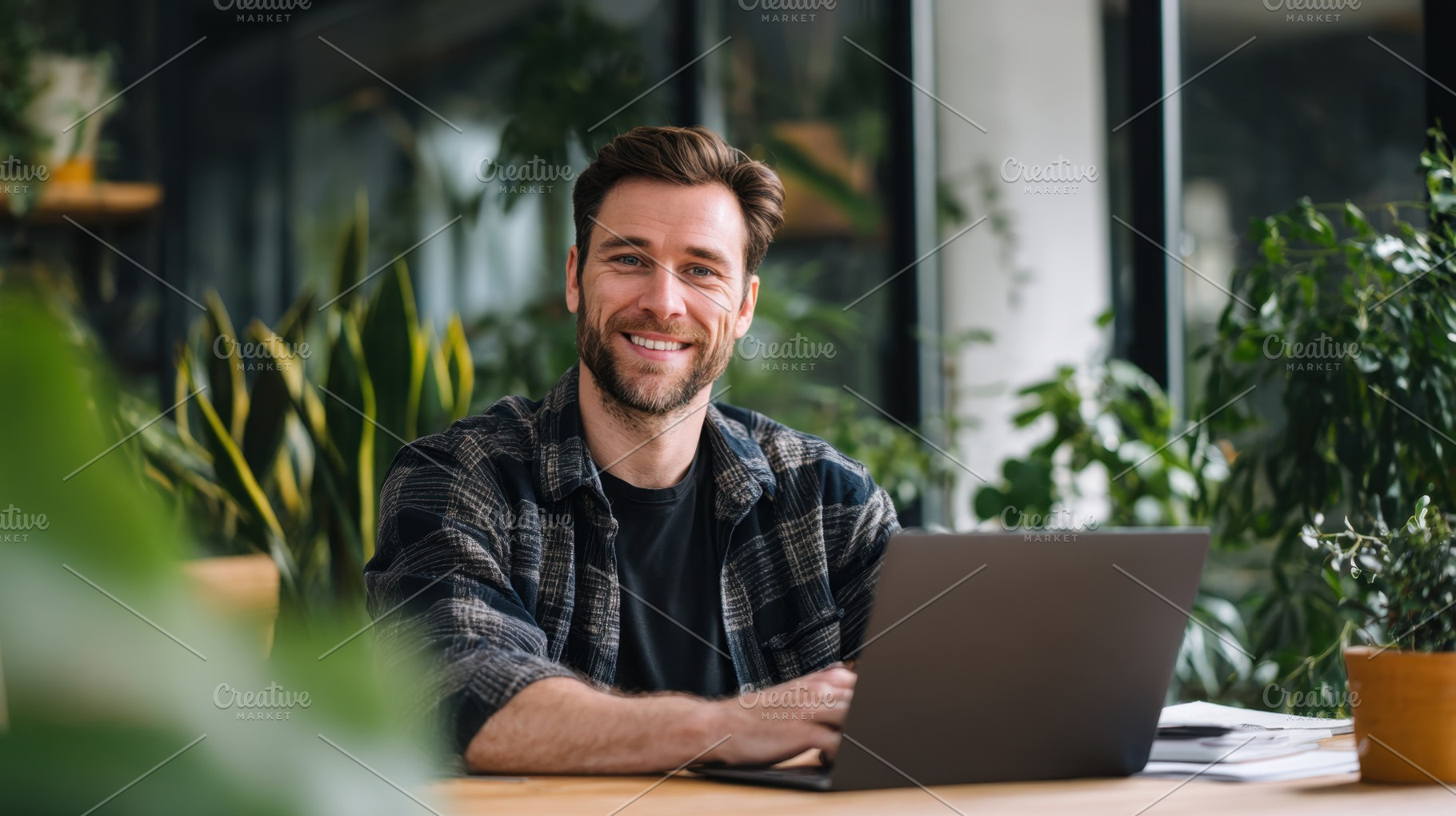 Man using laptop at office, a Photo by Beautiful things