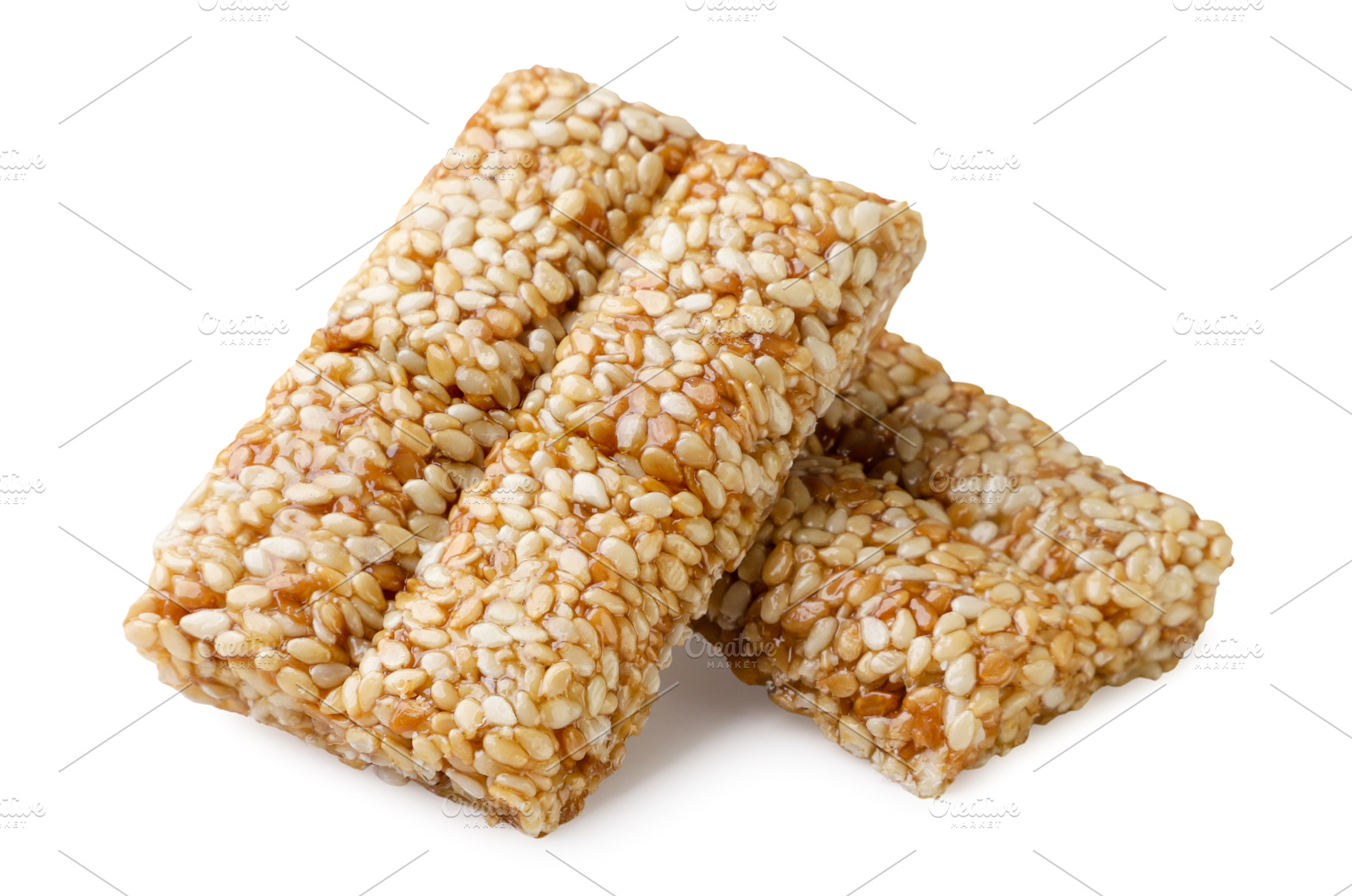 Two pieces of kozinaki with sesame, a Food & Drink Photo by innakreativ