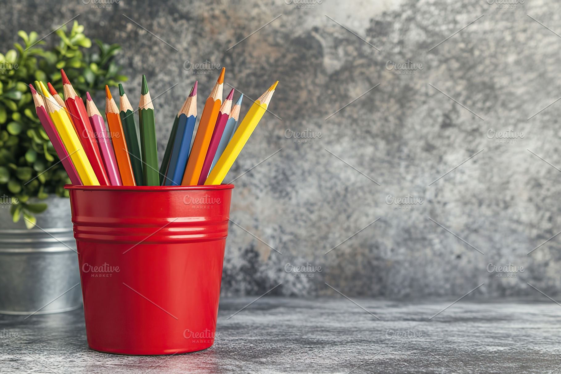 Wooden colorful rainbow pencils in bucket on wooden table, a School & Education Photo by AlyaAnd