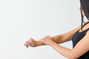 Moisturizing hands arm lotion hydrating applying, a Person Photo by Photo Drive Studio