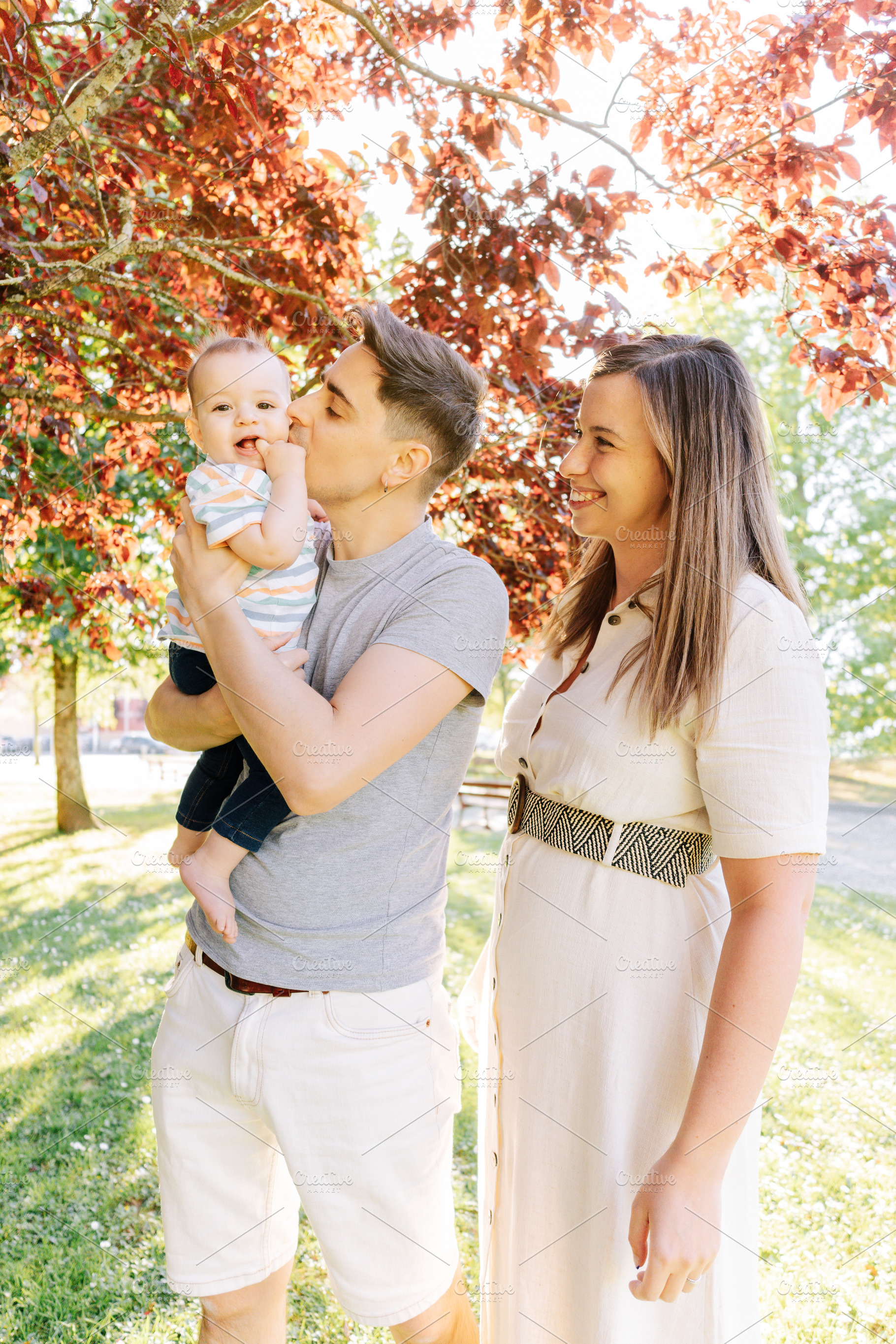 Portrait of a young family with their nine month old baby, a Person Photo by rubenchase