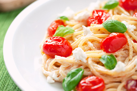 Spaghetti with cherry tomatoes and ricotta, a Food & Drink Photo by FoodStock