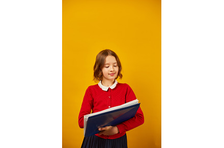 Thoughtful School teenage girl, a School & Education Photo by IlliaBondarPhotography
