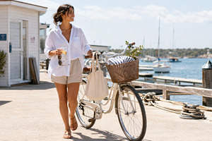 Woman enjoying sunny day at marina,, a Photo by Dvoevnore photos