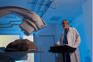 Radiologist performing X-ray, a Health & Medical Photo by HalfPoint