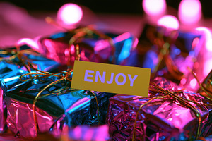 Festively wrapped gifts with tag