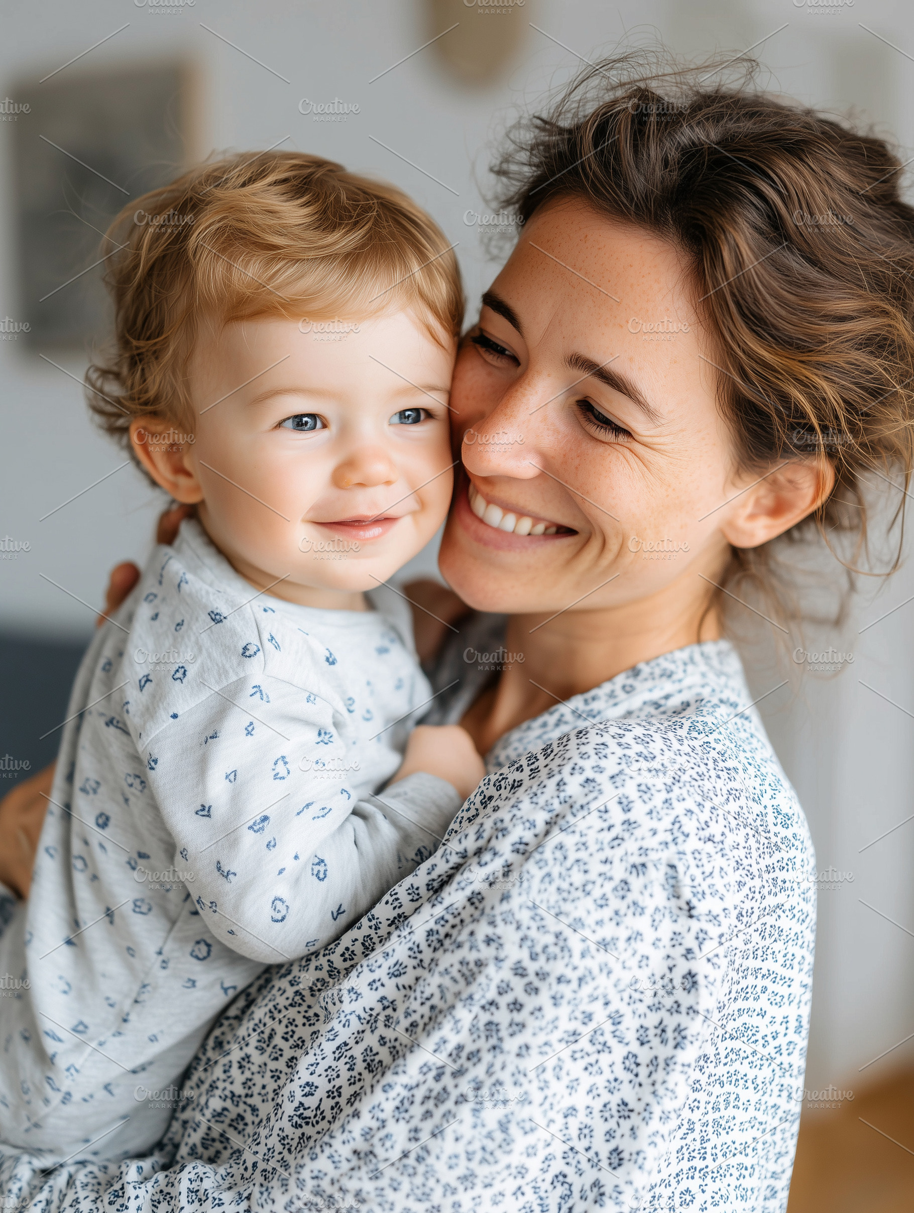 Happy young mother hold and cuddle, a Person Photo by MistyDay