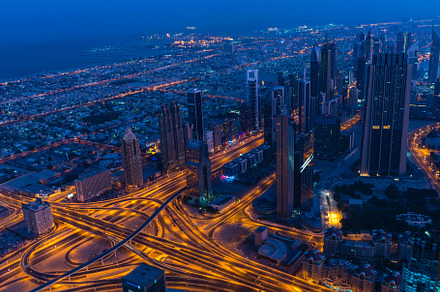 Dubai downtown night scene with city lights, an Architecture Photo by Dvoevnore photos