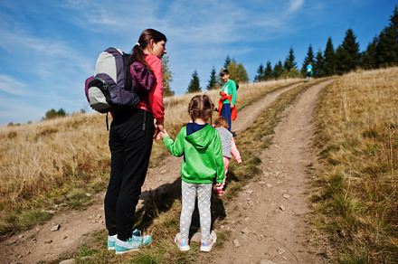 Woman is traveling with a childrens. Mom in the mountains. Climb, a Nature Photo by AS photostudio