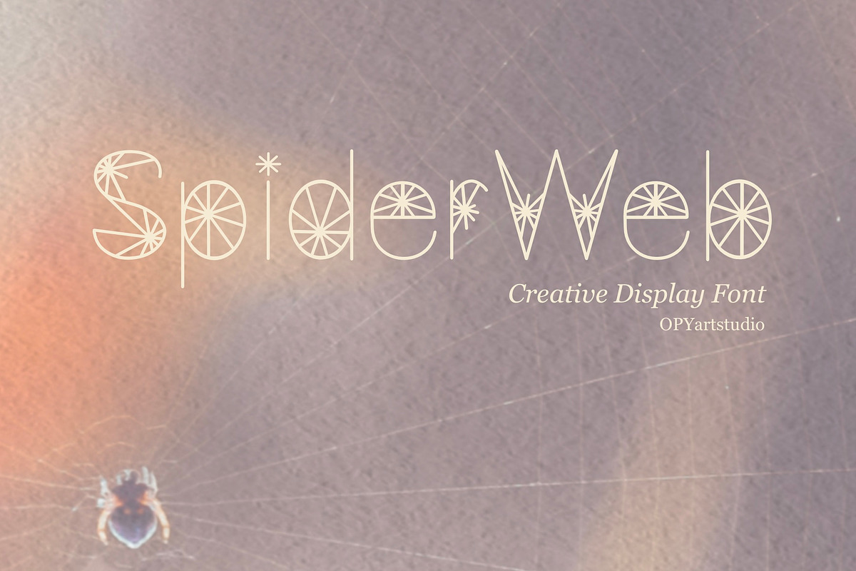 Spider Web - Creative Display Font, a Font by OPY ArtStudio (Photo 1 of 5)