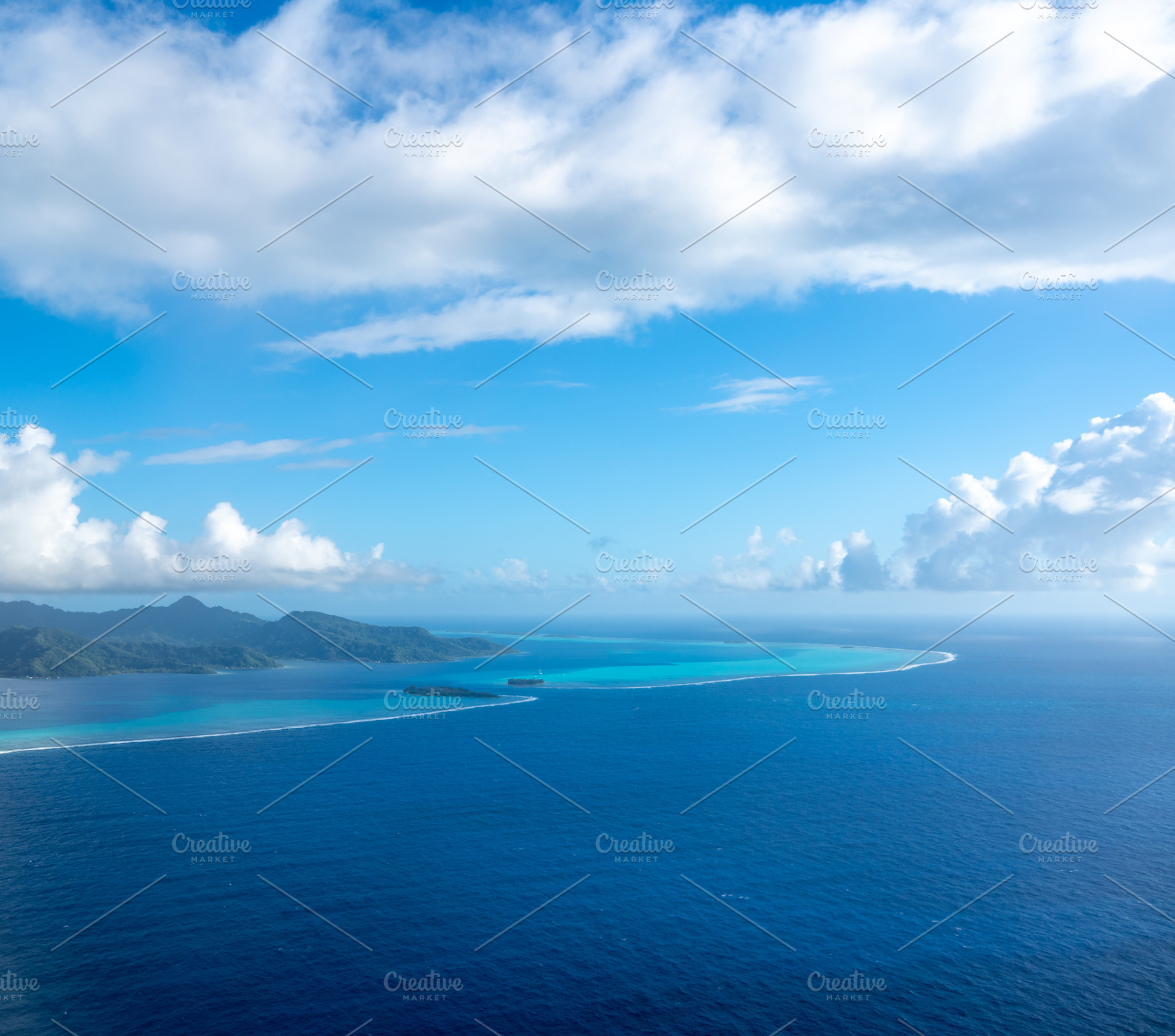 Aerial view of Tahaa island, French Polynesia, with turquoise la, a Photo by GoodGoods