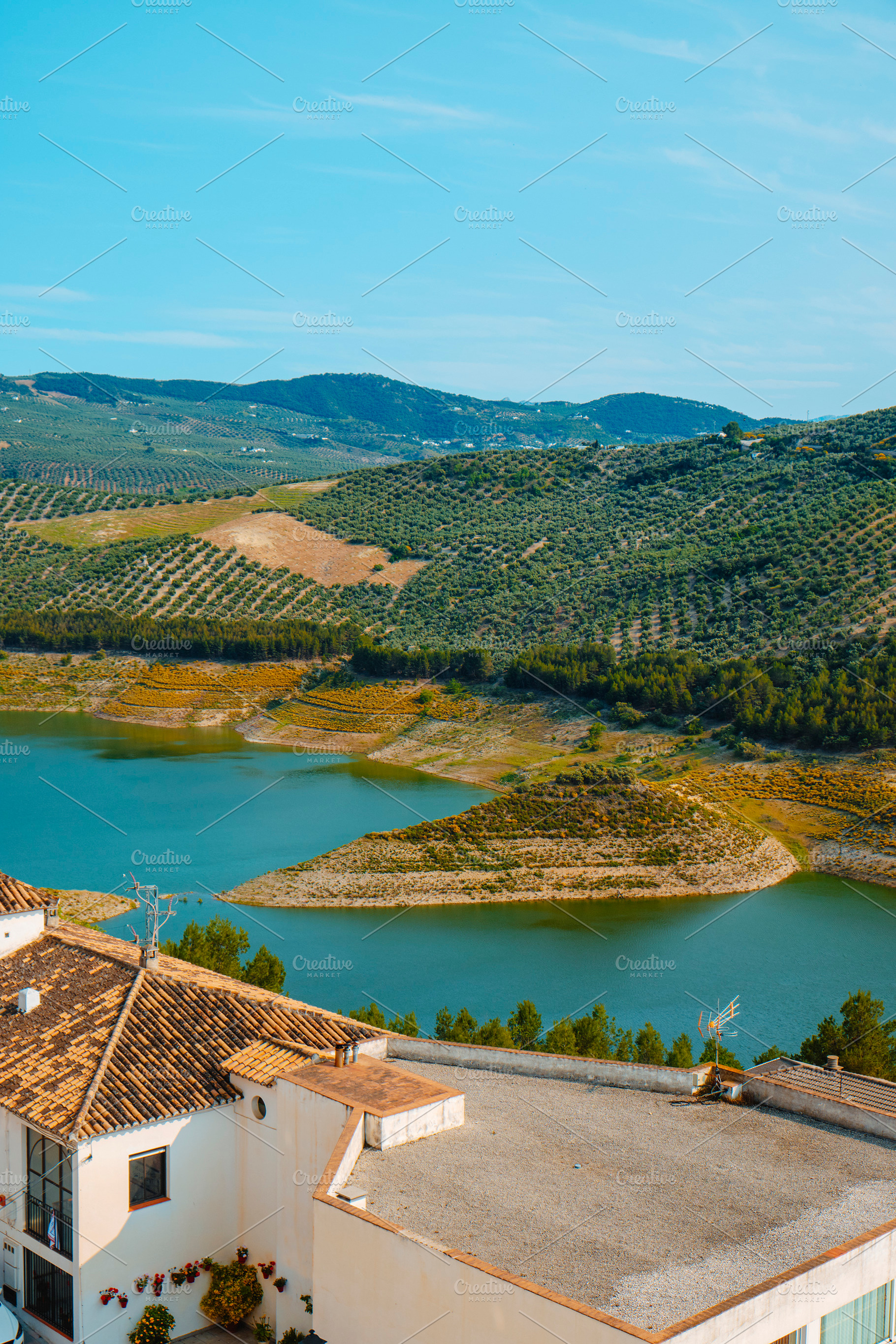 Iznajar from above with the reservoir and olive trees, a Photo by Nito