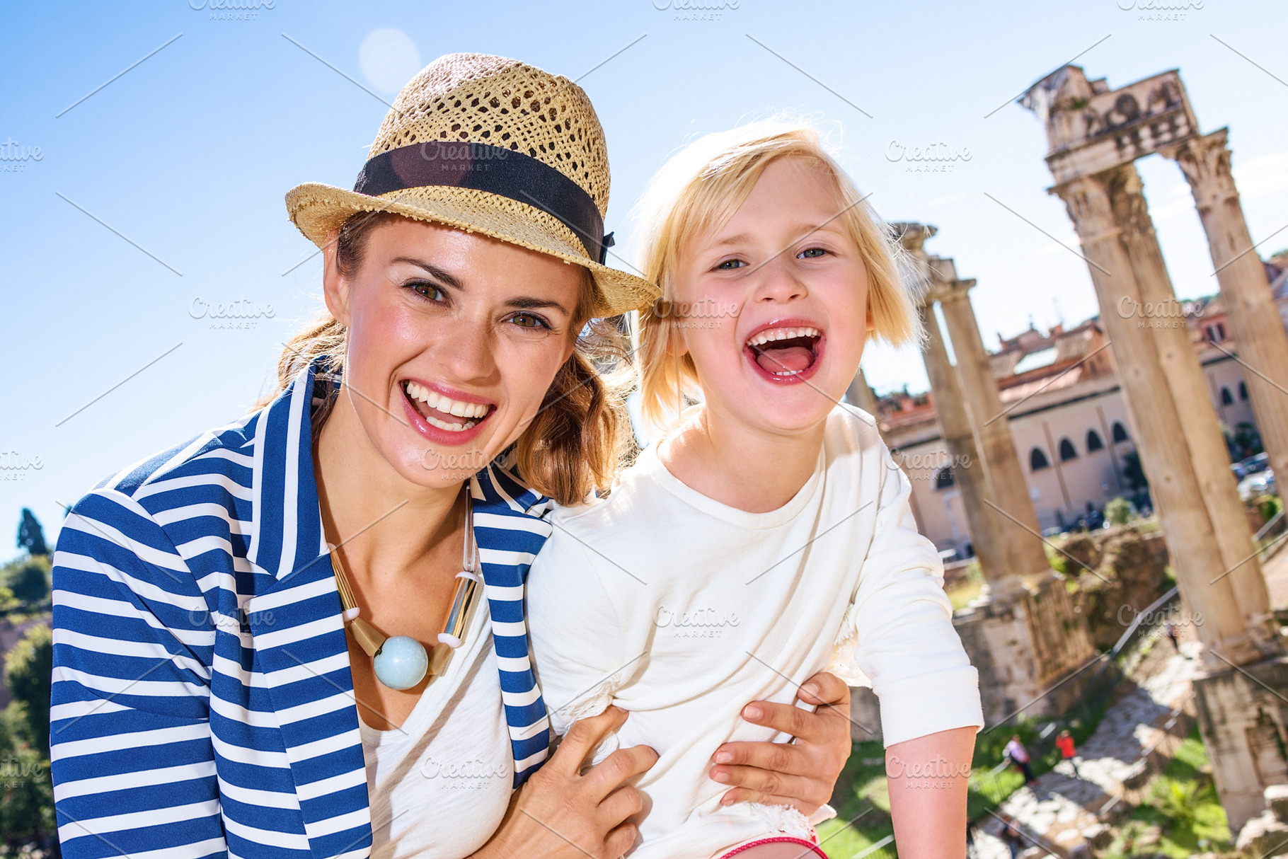 Smiling mother and daughter tourists stock photo containing ancient and, a Person Photo by Alliance Images