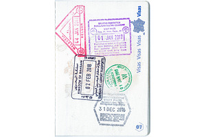 Stamps of Malaysia, Bahrain and Singapore in a French passport, a Business Photo by Leonid Andronov