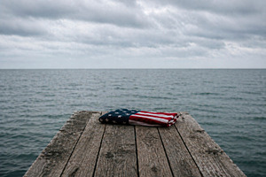 american flag at the end of a pier, generative AI, a Photo by Nito