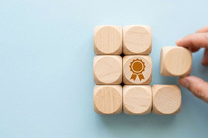 Wooden Blocks with Award Ribbon, a Background Photo by thepslr