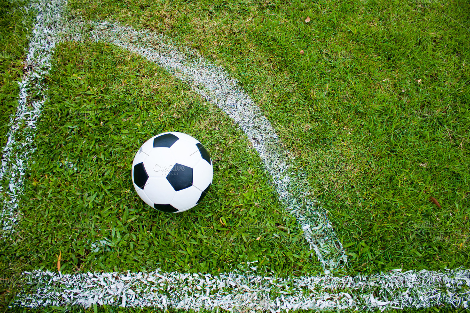 Ball on the edge of the corner featuring football, grass, and soccer, a Sports & Recreation Photo by a454