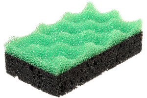 Rectangular piece of  porous sponge on isolated background, a Health & Medical Photo by ndanko