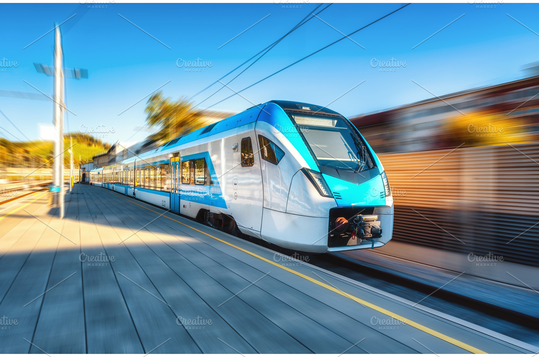 High-speed blue passenger train, a Transportation Photo by den-belitsky