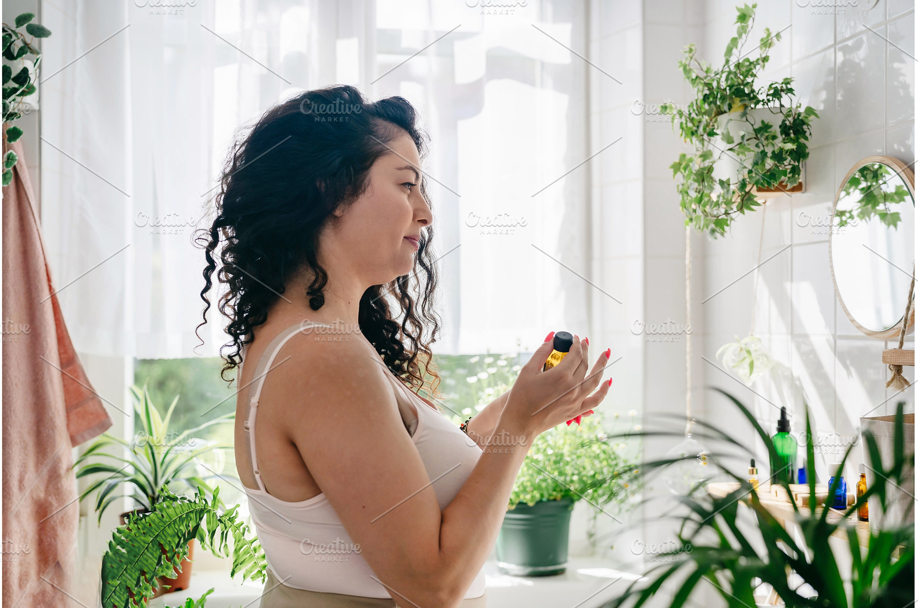 Young brunette woman holding glass, a Person Photo by Yummypic