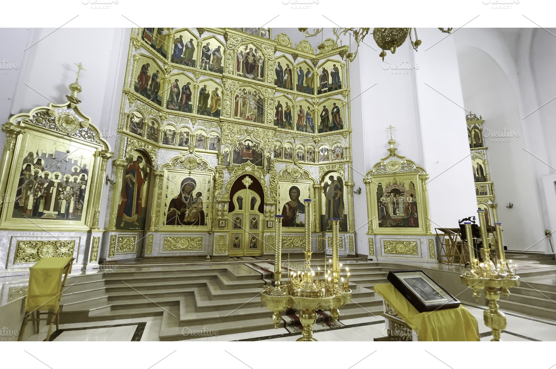 Wall of golden icons in church. Clip, a Holiday Photo by Media Whale Stock