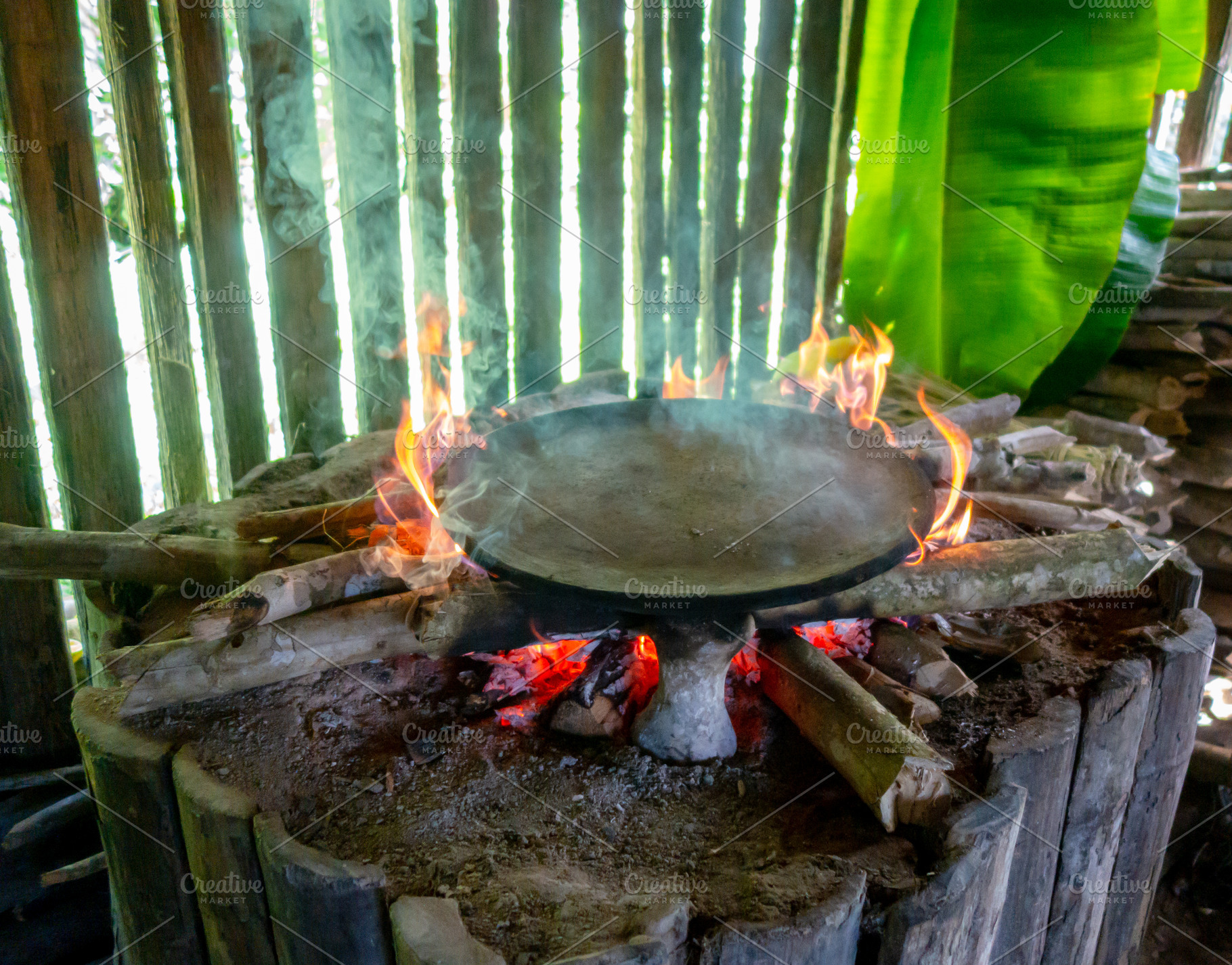 Cooking Cassava Cake in Siona Village, Cuyabeno, amazonia, Ecuad, a Food & Drink Photo by GoodGoods