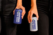 Two Hands Holding Beer Cans Mockup, a Cups & Container Mockup by The Rose Project (Thumbnail 2 of 3)