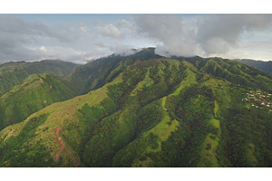 Lush tropical mountains covered in, a Beauty & Fashion Photo by Goinyk