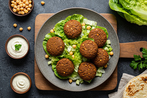 Crispy falafel served on a bed of fr, a Food & Drink Photo by professorinc