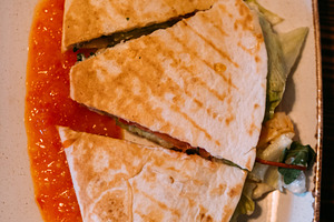 Pita sandwich cut burrito stuffed flatbread served, a Food & Drink Photo by Photo Drive Studio