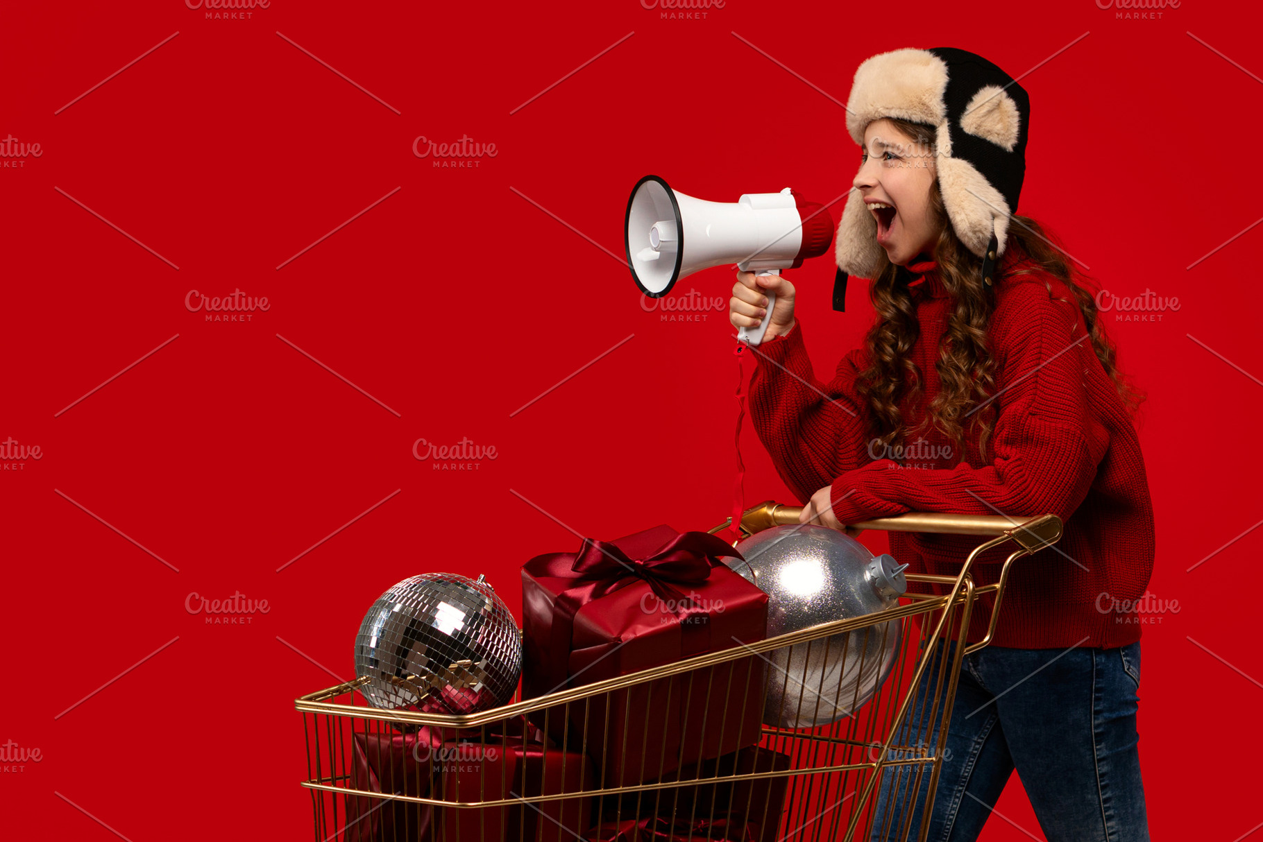 Girl in red sweater and fur hat, a Holiday Photo by Elena Vagengeim
