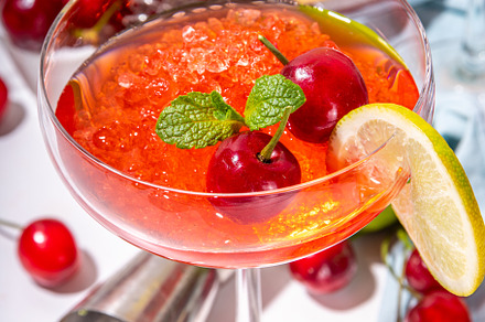 Cherry and lime alcoholic booze cocktail, a Food & Drink Photo by Rimma