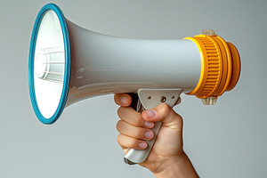 A hand holding a modern, colorful megaphone, showcasing a vibran, a Person Photo by ImageMir