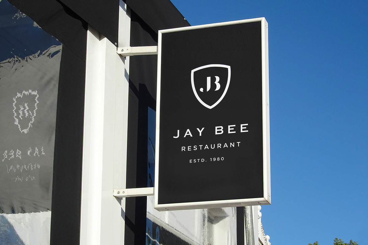 Logo Mockup Hanging Sign, an Advertising Mockup by Asylab (Photo 1 of 5)