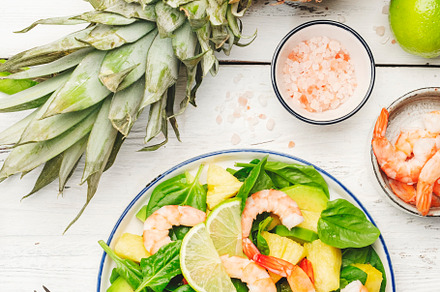 Pineapple shrimp salad with spinach, avocado and lime on white w, a Food & Drink Photo by 5PH