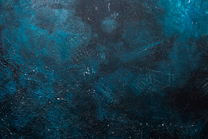 Blue old scratched painted texture or background with grain elem