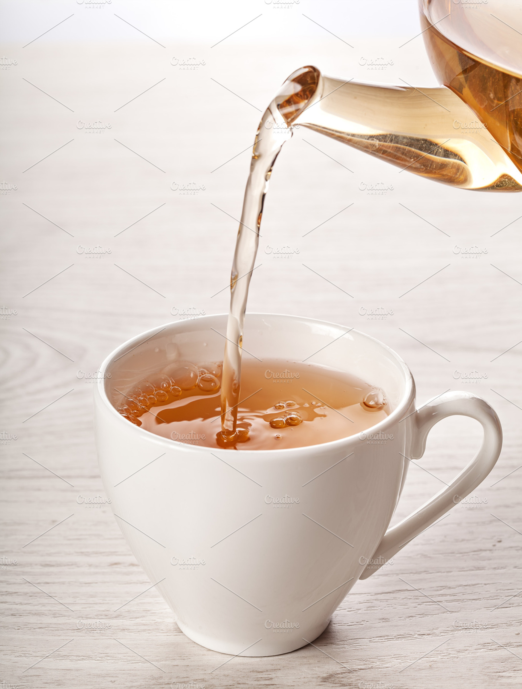 Hot tea in white cup featuring background, beverage, and breakfast