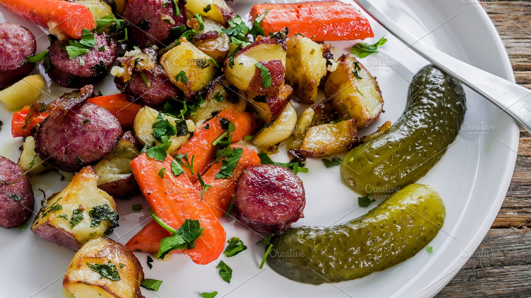 Colorful plate of cooked vegetables, a Photo by 1miromiro